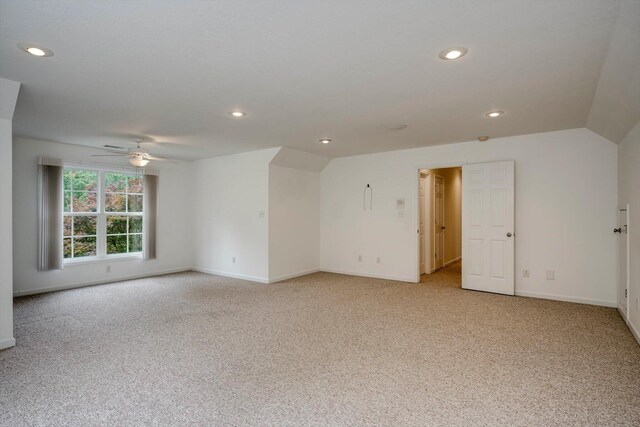 2288 William Few Pkwy, Evans, GA 30809 - spare room with light colored carpet, baseboards, recessed lighting, ceiling fan, and vaulted ceiling