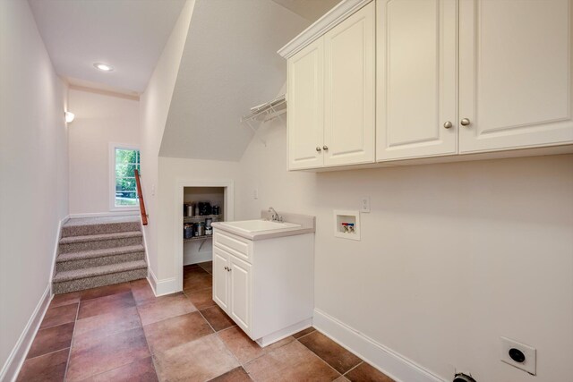 2288 William Few Pkwy, Evans, GA 30809 - laundry area featuring hookup for an electric dryer, cabinet space, baseboards, washer hookup, and recessed lighting