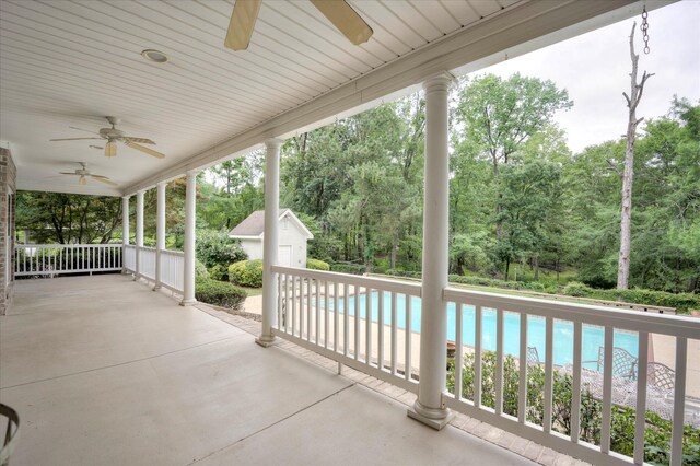 2288 William Few Pkwy, Evans, GA 30809 - view of patio / terrace with ceiling fan, an outdoor pool, and an outdoor structure