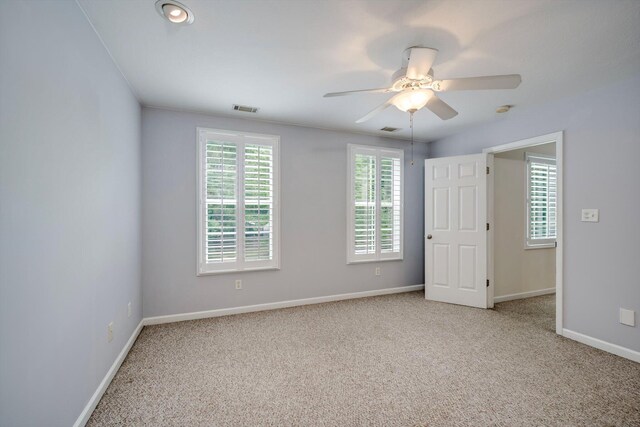 2288 William Few Pkwy, Evans, GA 30809 - unfurnished bedroom featuring carpet, baseboards, and a ceiling fan