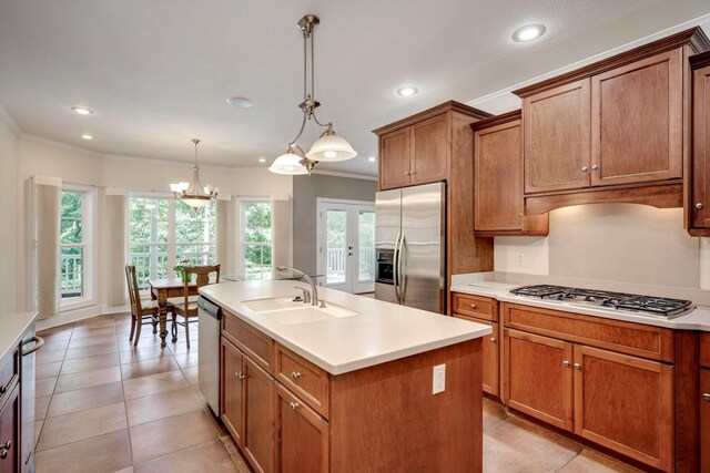 2288 William Few Pkwy, Evans, GA 30809 - kitchen with appliances with stainless steel finishes, ornamental molding, recessed lighting, brown cabinets, and light countertops