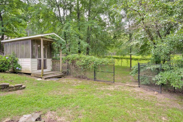 2288 William Few Pkwy, Evans, GA 30809 - view of yard with a gate and a sunroom