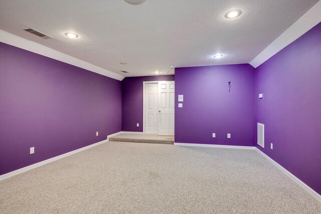 2288 William Few Pkwy, Evans, GA 30809 - spare room featuring carpet, baseboards, recessed lighting, and a textured ceiling