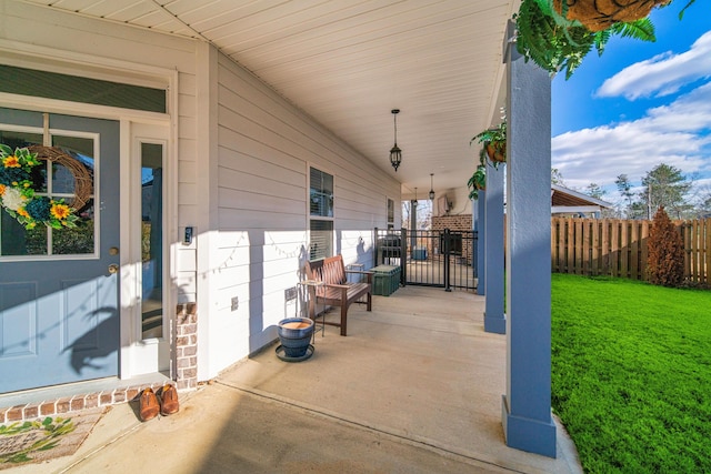 view of patio featuring a porch