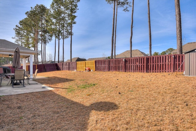 view of yard with a patio area