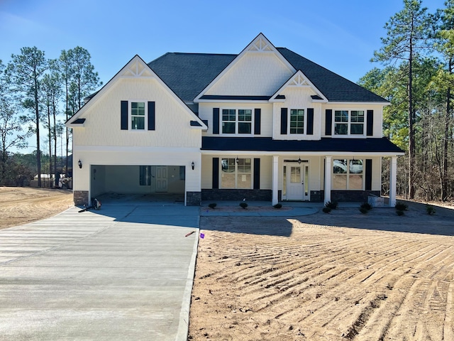 view of front facade with a carport and covered porch