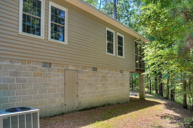 view of home's exterior featuring cooling unit