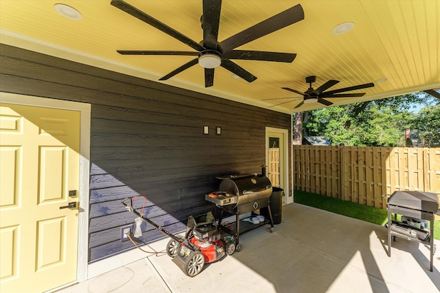 view of patio / terrace with area for grilling and ceiling fan