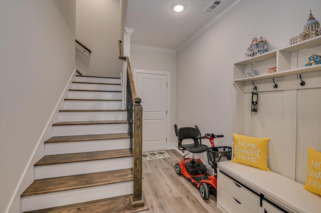 8073 Crossbow Lndg, Graniteville, SC 29829 - stairs featuring crown molding, wood finished floors, and recessed lighting