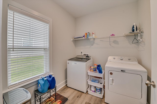 8073 Crossbow Lndg, Graniteville, SC 29829 - laundry area with washer and clothes dryer, light wood-style flooring, and baseboards