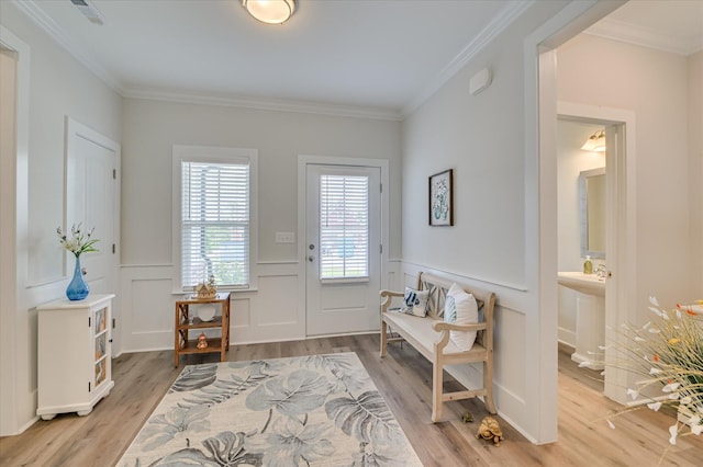 8073 Crossbow Lndg, Graniteville, SC 29829 - foyer entrance with ornamental molding, light wood-style floors, a wainscoted wall, and a decorative wall