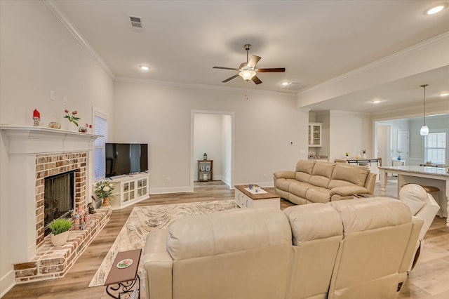 8073 Crossbow Lndg, Graniteville, SC 29829 - living area with ceiling fan, light wood-style floors, baseboards, crown molding, and recessed lighting