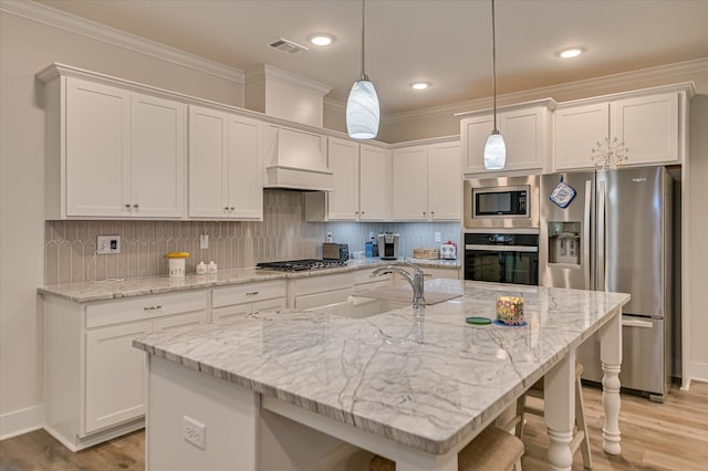 8073 Crossbow Lndg, Graniteville, SC 29829 - kitchen with appliances with stainless steel finishes, white cabinetry, a sink, light wood-style flooring, and crown molding