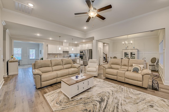 8073 Crossbow Lndg, Graniteville, SC 29829 - living area featuring light wood finished floors, ceiling fan, a chandelier, ornamental molding, and recessed lighting