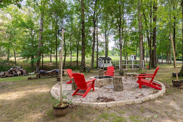 2700 Summit Ridge Rd, Evans, GA 30809 - view of yard with a fire pit and a storage shed