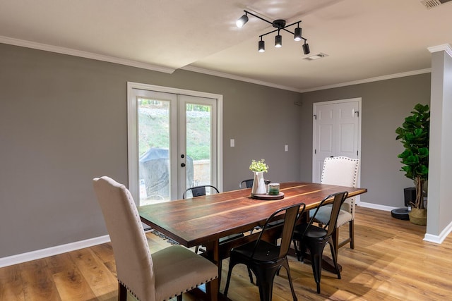 2700 Summit Ridge Rd, Evans, GA 30809 - dining area featuring french doors, light wood-type flooring, and ornamental molding