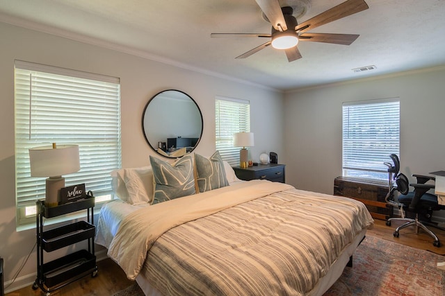 2700 Summit Ridge Rd, Evans, GA 30809 - bedroom featuring crown molding, wood finished floors, multiple windows, and ceiling fan