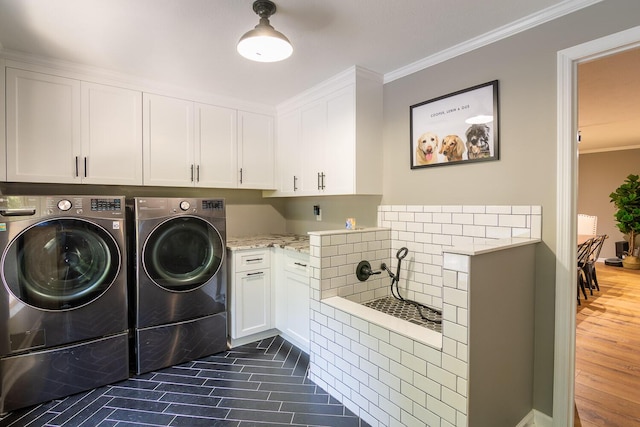 2700 Summit Ridge Rd, Evans, GA 30809 - washroom featuring cabinet space, washer and clothes dryer, and crown molding