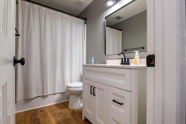 2700 Summit Ridge Rd, Evans, GA 30809 - bathroom featuring vanity, wood finished floors, and shower / tub combo with curtain