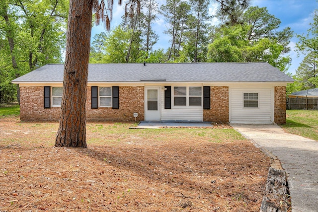 3409 Arden Ct, Augusta, GA 30906 - ranch-style house with a patio, roof with shingles, fence, and brick siding
