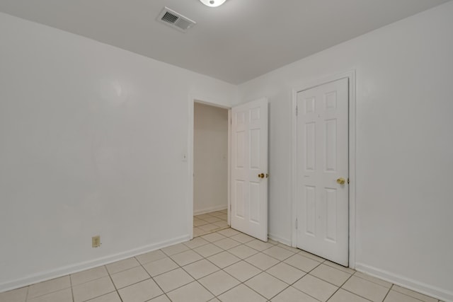3409 Arden Ct, Augusta, GA 30906 - spare room with light tile patterned floors, visible vents, and baseboards