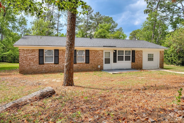 3409 Arden Ct, Augusta, GA 30906 - single story home featuring brick siding, a shingled roof, and a patio area
