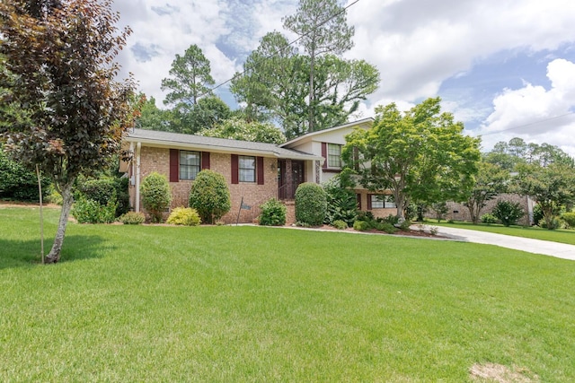 2161 Chadwick Rd, Augusta, GA 30906 - tri-level home featuring brick siding, a front yard, and concrete driveway