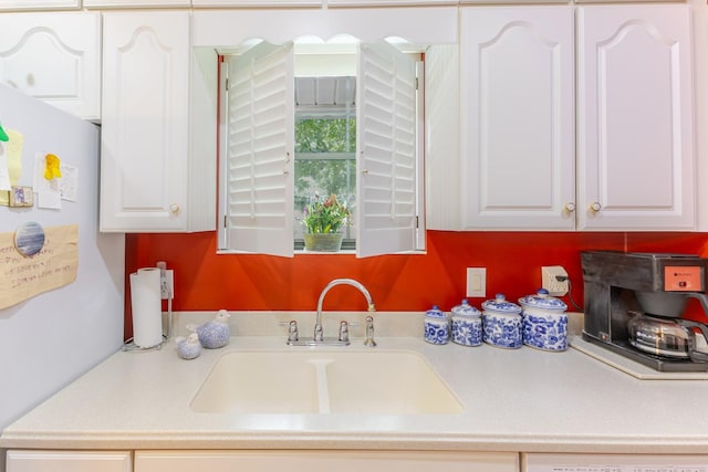 2161 Chadwick Rd, Augusta, GA 30906 - kitchen featuring freestanding refrigerator, white cabinets, and light countertops