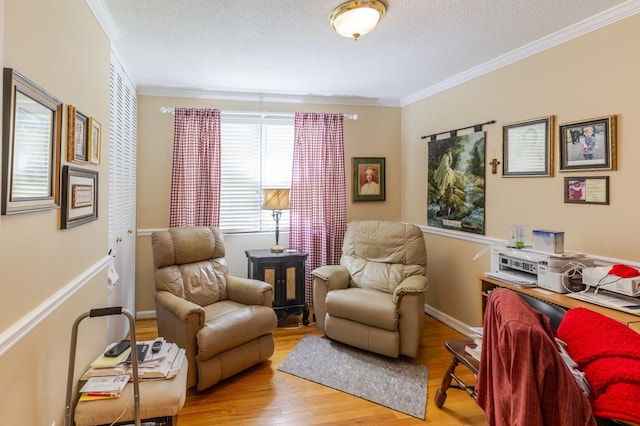 2161 Chadwick Rd, Augusta, GA 30906 - sitting room with ornamental molding, wood finished floors, and a textured ceiling