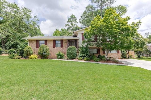 2161 Chadwick Rd, Augusta, GA 30906 - tri-level home with brick siding, a front lawn, and concrete driveway