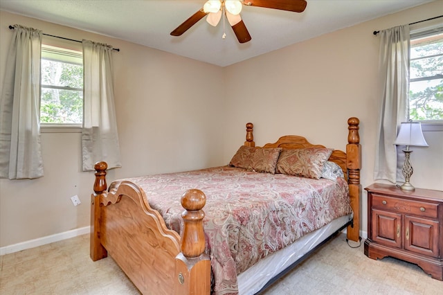 2314 Canberra Ct, Augusta, GA 30906 - bedroom featuring multiple windows, light flooring, ceiling fan, and baseboards