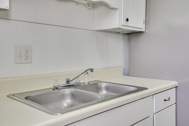 2314 Canberra Ct, Augusta, GA 30906 - kitchen with a sink, white cabinetry, and light countertops
