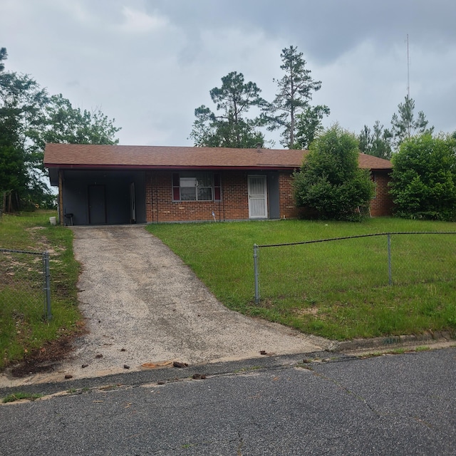 2314 Canberra Ct, Augusta, GA 30906 - ranch-style house featuring brick siding, asphalt driveway, and an attached carport