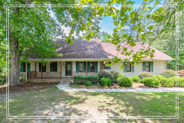 805 Kimball Pond Rd, Aiken, SC 29803 - ranch-style home with a porch, a front lawn, and a shingled roof