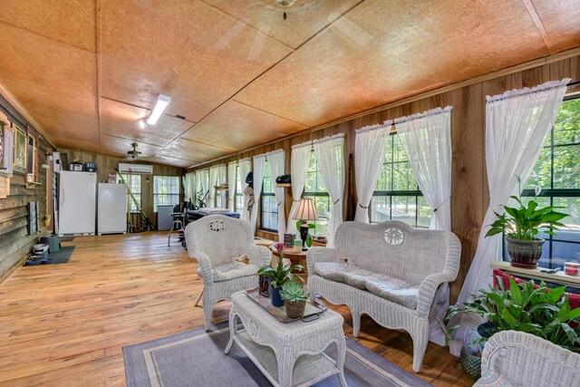 2960 Old Thomson Rd, Appling, GA 30802 - sunroom / solarium with hardwood / wood-style flooring and wood walls