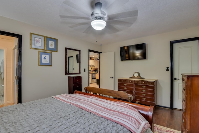 2960 Old Thomson Rd, Appling, GA 30802 - bedroom featuring a textured ceiling, ceiling fan, and wood finished floors