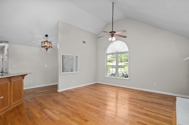 603 Ridgefield Dr, North Augusta, SC 29841 - unfurnished living room with a ceiling fan, high vaulted ceiling, and light wood-style floors