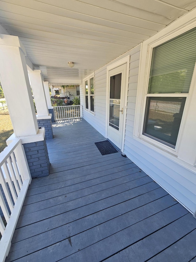 deck with covered porch