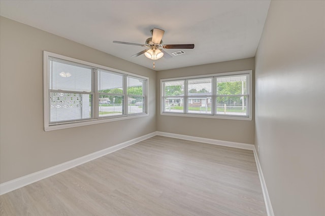 415 Aiken St, Augusta, GA 30901 - spare room featuring light wood finished floors, baseboards, and a ceiling fan