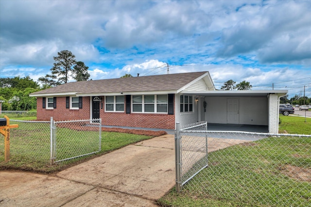 415 Aiken St, Augusta, GA 30901 - ranch-style home featuring brick siding, a gate, driveway, a carport, and roof with shingles