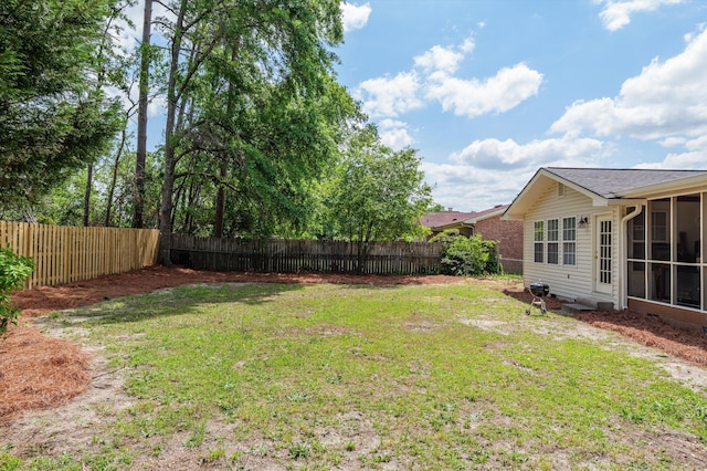 view of yard featuring a fenced backyard
