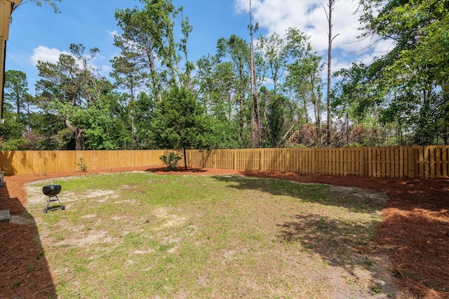 view of yard featuring a fenced backyard