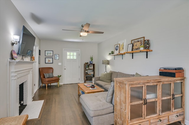1745 Oak Dr, Augusta, GA 30904 - living room featuring ceiling fan, a fireplace, and dark wood finished floors