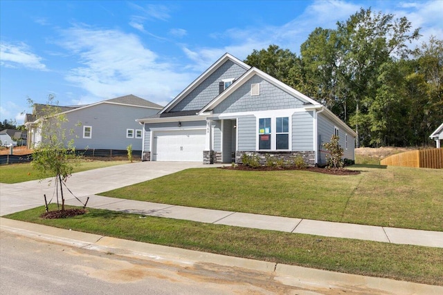 craftsman-style house featuring a front yard and a garage