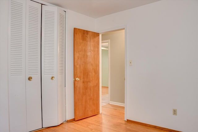 3515 Potomac Dr, Augusta, GA 30906 - unfurnished bedroom with light wood-type flooring, a closet, and baseboards