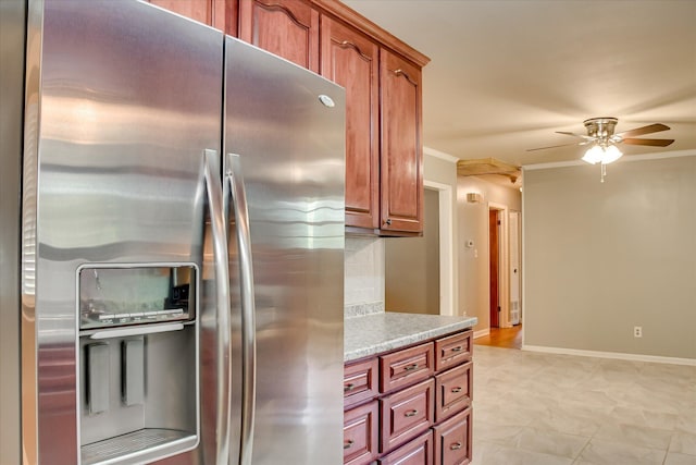 3515 Potomac Dr, Augusta, GA 30906 - kitchen with stainless steel refrigerator with ice dispenser, a ceiling fan, ornamental molding, brown cabinets, and baseboards