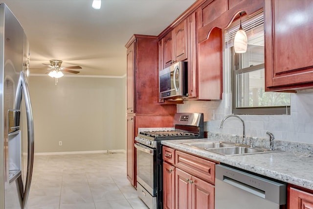 3515 Potomac Dr, Augusta, GA 30906 - kitchen featuring appliances with stainless steel finishes, ceiling fan, a sink, baseboards, and ornamental molding