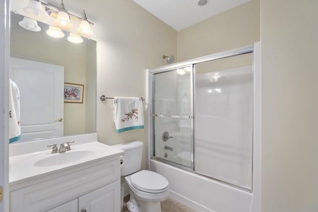 403 Ascot Dr, Aiken, SC 29803 - bathroom with vanity, combined bath / shower with glass door, tile patterned floors, and toilet