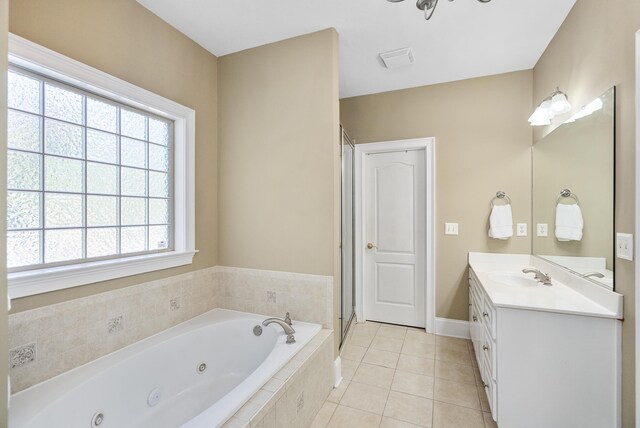 403 Ascot Dr, Aiken, SC 29803 - full bathroom with a jetted tub, visible vents, tile patterned flooring, a shower stall, and vanity