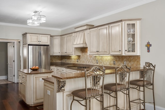 403 Ascot Dr, Aiken, SC 29803 - kitchen with freestanding refrigerator, a peninsula, baseboards, custom range hood, and glass insert cabinets